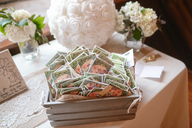 wildseed packets for guests to take home as favors | photo: Photos by Kristopher | via https://emmalinebride.com