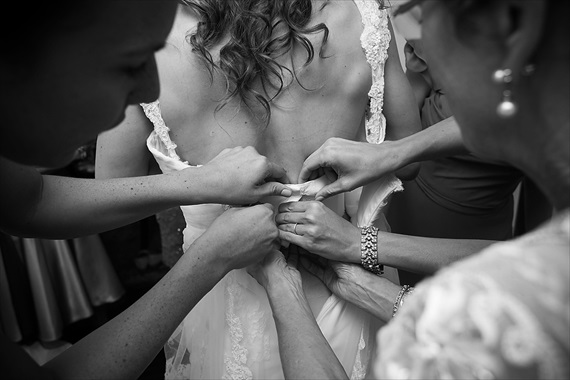 Dennis Drenner Photographs - baltimore museum wedding - bride putting on dress
