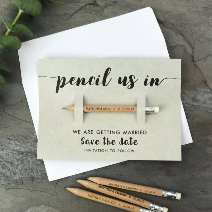 Golfing themed save the date with golf pencil