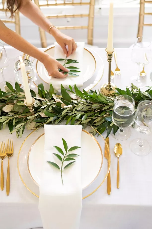 fresh olive greenery garland to decorate wedding tables