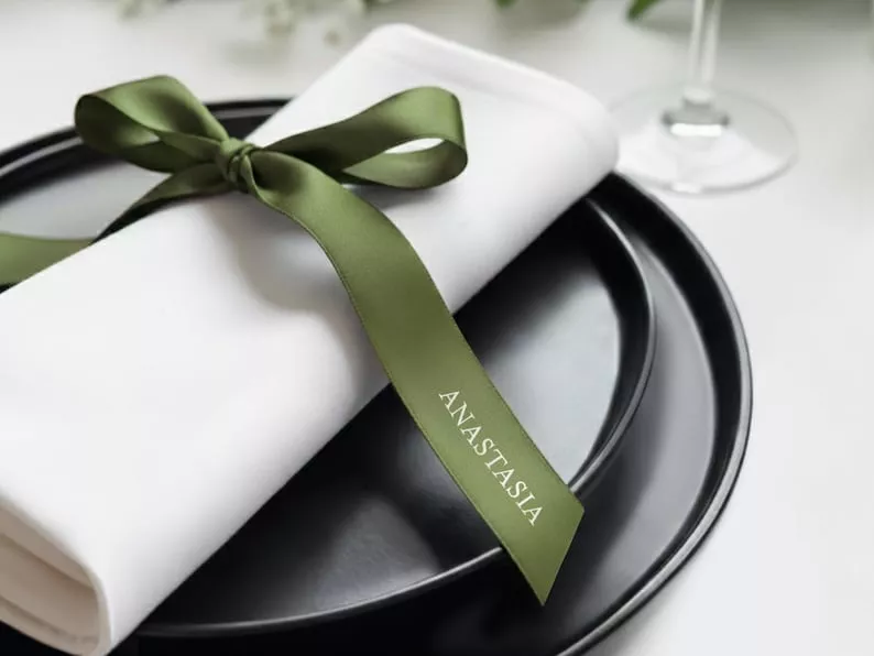 elegant ribbon-tied wedding napkins with names for decorations