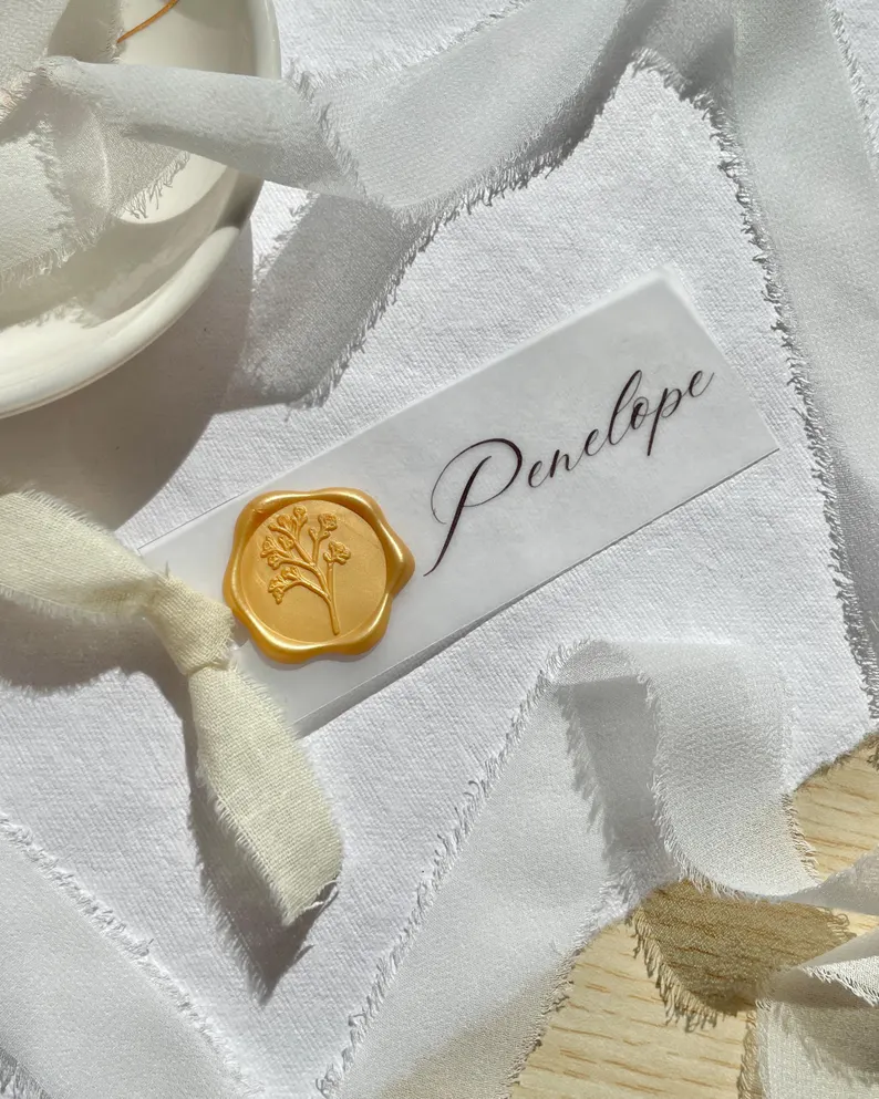 elegant wedding place card with vellum and calligraphy