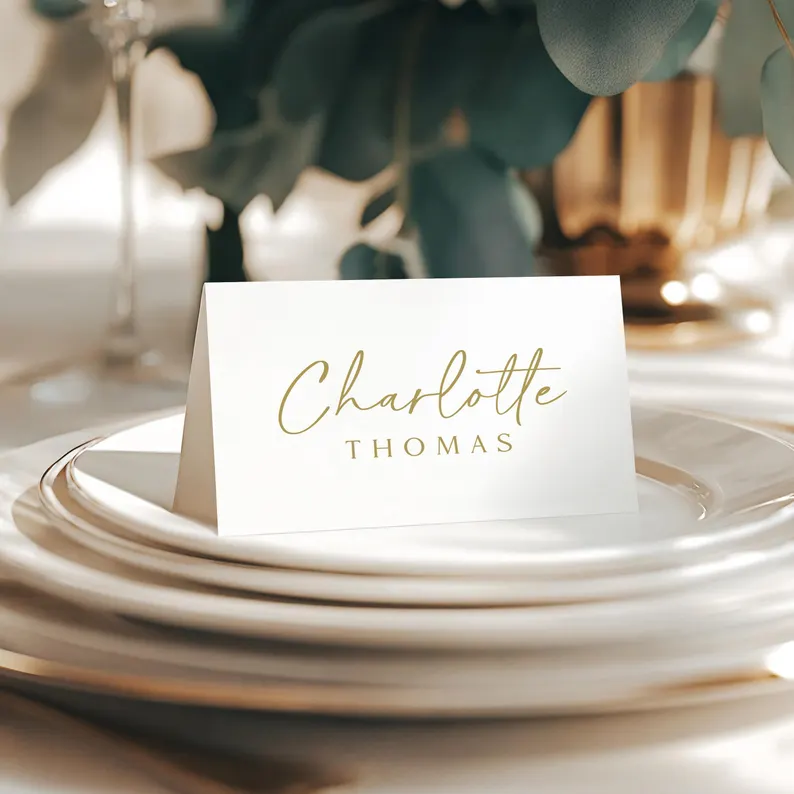 wedding place cards at reception table setting