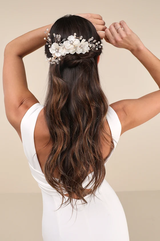bride wearing beaded floral hair comb instead of a veil