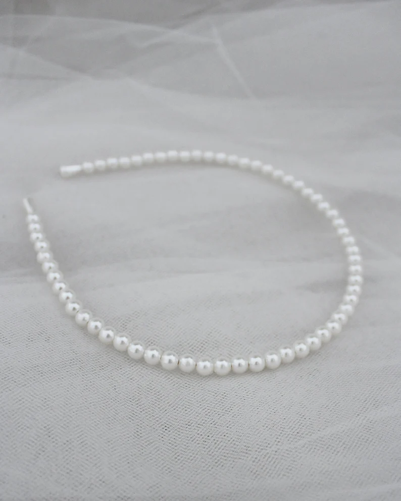 bridal headband made of delicate pearls instead of a veil