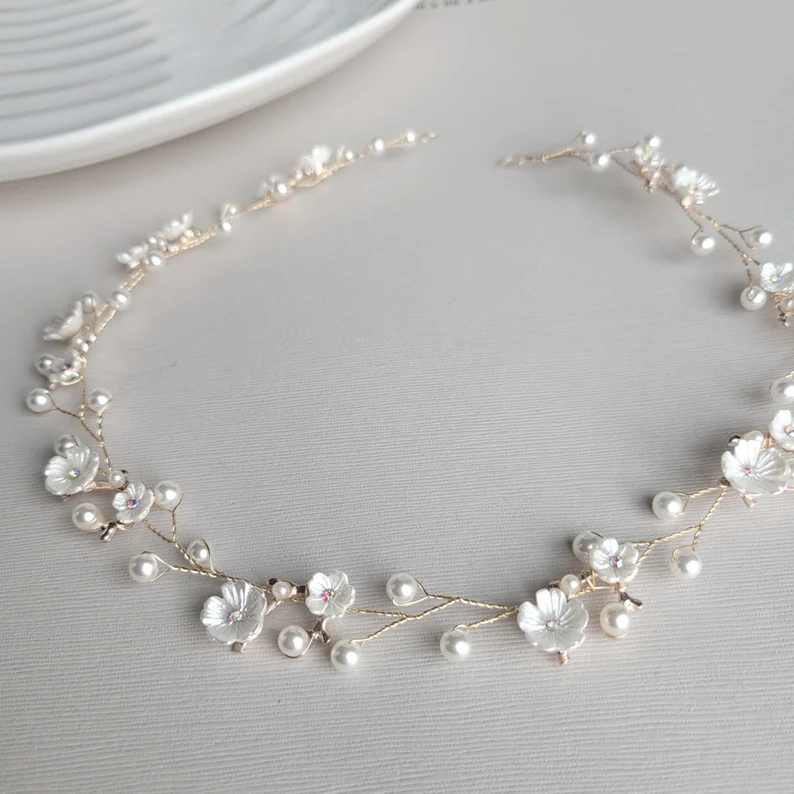 what to wear instead of a wedding veil - bride wearing a pearl headband as a bridal veil alternative