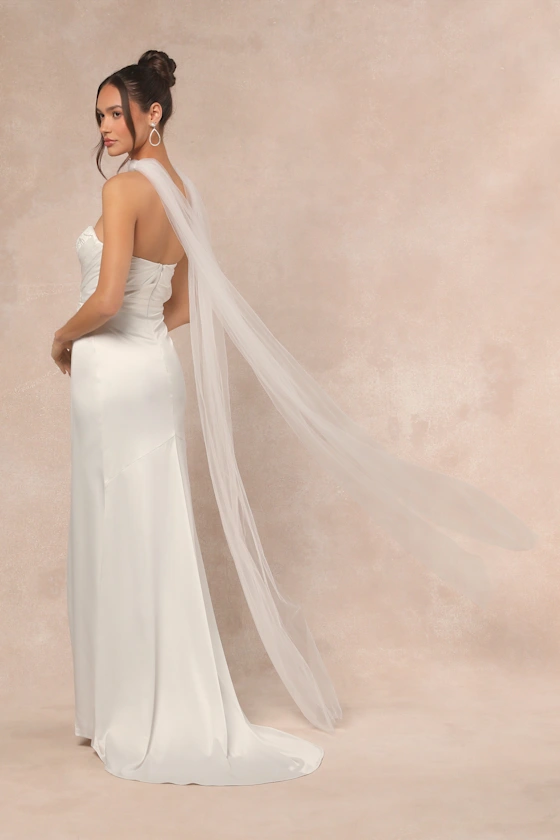 what to wear instead of a wedding veil – bride wearing a sheer bridal scarf instead of a wedding veil