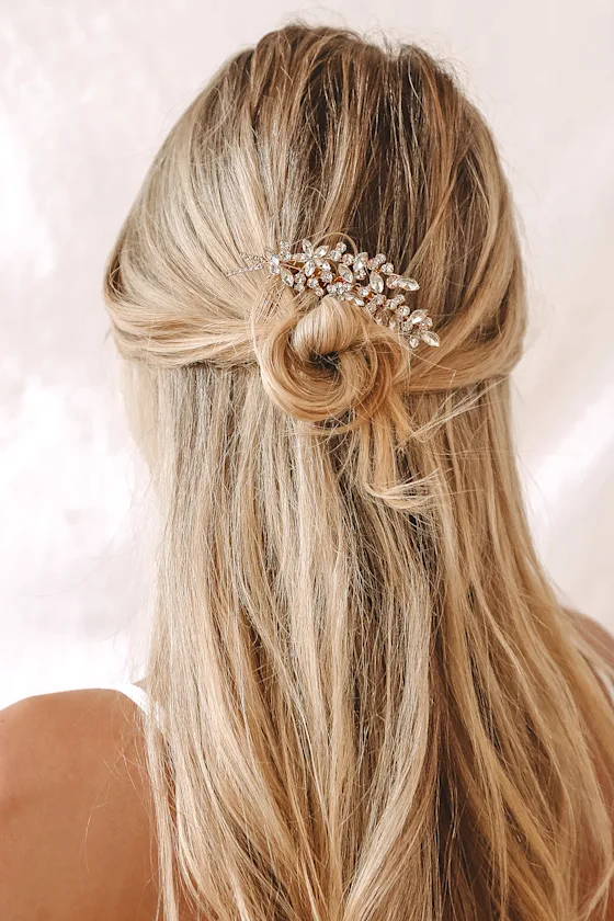 bride wearing gold rhinestone embellished hair comb in place of a veil