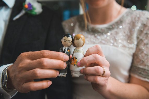 wood peg dolls by goosegrease | via Wood Themed Wedding Ideas: https://emmalinebride.com/themes/wood-themed-wedding-ideas/