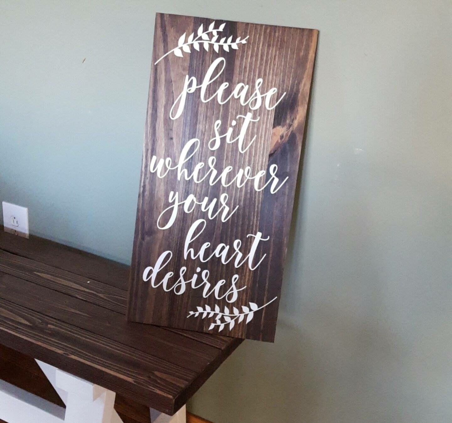 please sit wherever your heart desires sign