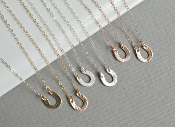 tiny horseshoe necklaces by silverlotusdesigns | barn reception ideas for weddings via https://emmalinebride.com/reception/barn-ideas-weddings/ ‎