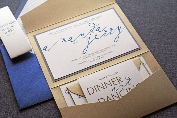 modern calligraphy script wedding invitations in gold and navy