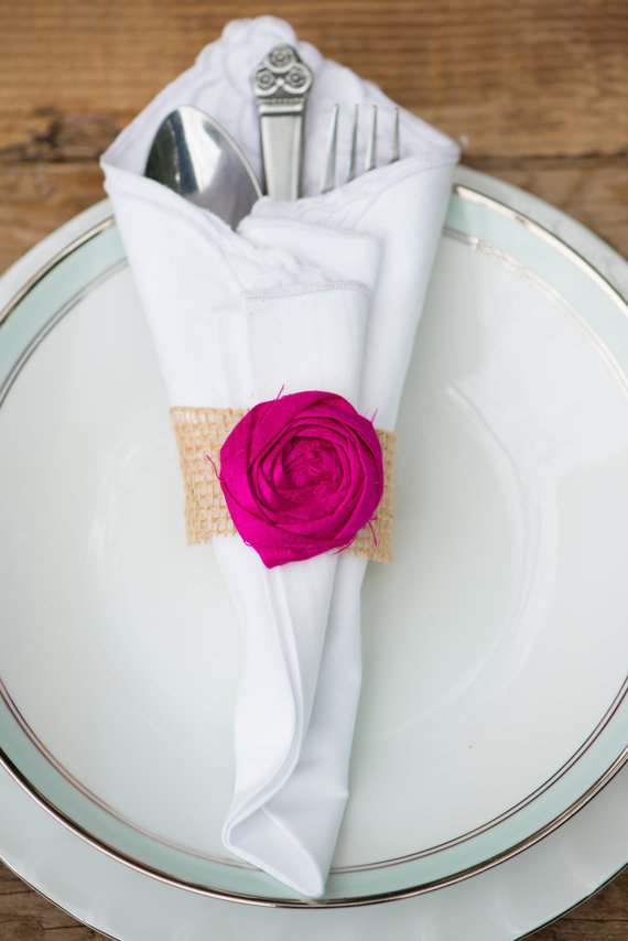 napkin ring with burlap and flower by bellerosedesigns | Top 10 Burlap Ideas for Spring & Summer Weddings https://emmalinebride.com/rustic/burlap-ideas-weddings/