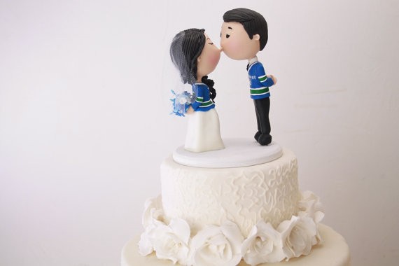 cute kissing couple cake topper vancouver hockey jerseys | figurine cake toppers that look like you | by artifice producciones | https://emmalinebride.com/reception/figurine-cake-toppers/