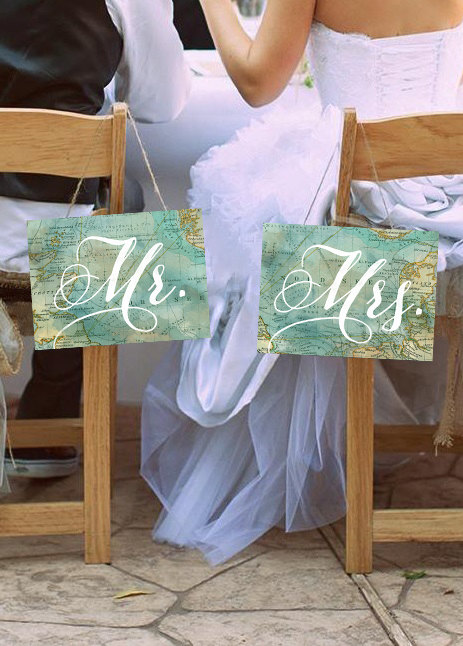 map chair signs | travel themed wedding ideas: https://emmalinebride.com/themes/travel-theme-wedding-ideas/