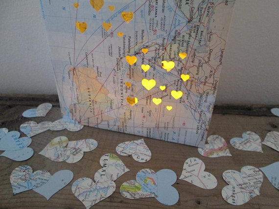 map confetti | travel themed wedding ideas: https://emmalinebride.com/themes/travel-theme-wedding-ideas/