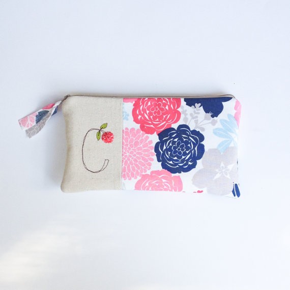 bridesmaid clutch purse with initial and flower print by mamableudesigns | bridesmaid clutches instead of flowers via https://emmalinebride.com/bridesmaid/clutches-instead-of-flowers/