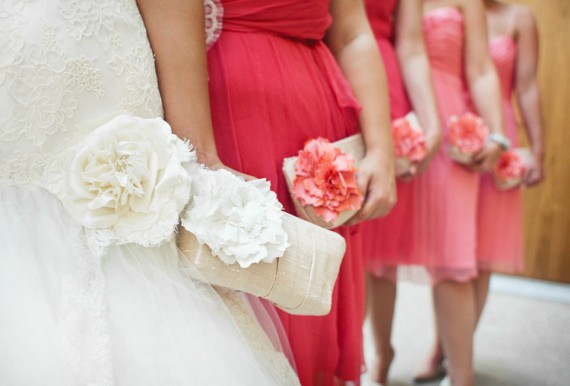coral pink bridesmaid clutches | bridesmaid clutches instead of flowers via https://emmalinebride.com/bridesmaid/clutches-instead-of-flowers/