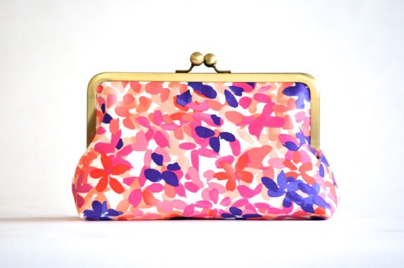 floral orange and purple bridesmaid clutch | bridesmaid clutches instead of flowers via https://emmalinebride.com/bridesmaid/clutches-instead-of-flowers/