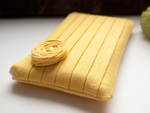 yellow rosette bridesmaid clutch | bridesmaid clutches instead of flowers via https://emmalinebride.com/bridesmaid/clutches-instead-of-flowers/