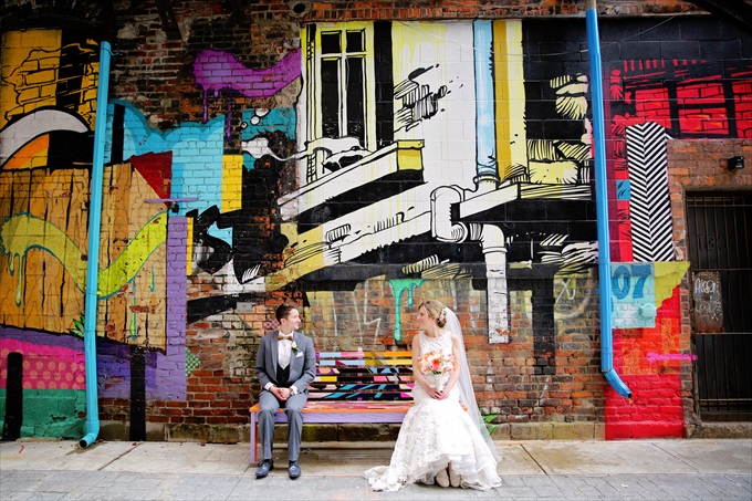 Detroit_wedding_bride_groom_art_graffiti Downtown Detroit Wedding - https://emmalinebride.com/real-weddings/a-beautiful-downtown-detroit-wedding-nick-jeannine/ | Michigan wedding photographer - The Camera Chick