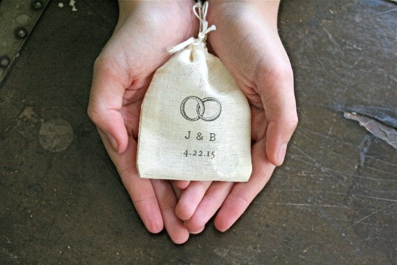 ring pillow bag with rings | 41 Beautiful Rustic Ring Pillows on Etsy | https://emmalinebride.com/rustic/ring-pillows-etsy-weddings/