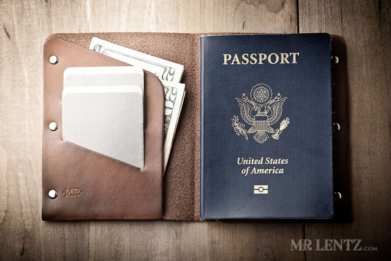 leather passport wallet | via 40+ Best Leather Groomsmen Gifts for Weddings | https://emmalinebride.com/gifts/leather-groomsmen-gifts/