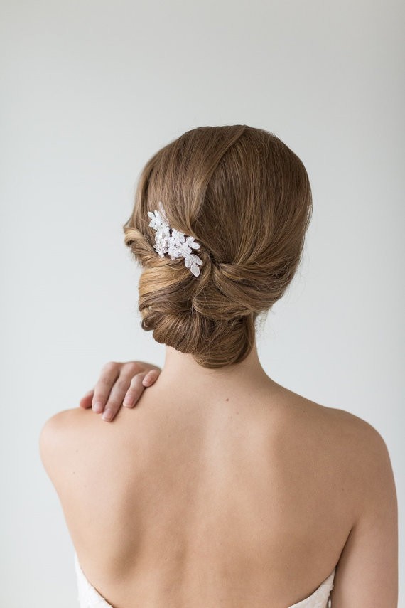 pulled back chignon | 50+ Best Bridal Hairstyles Without Veil | https://emmalinebride.com/bride/best-bridal-hairstyles
