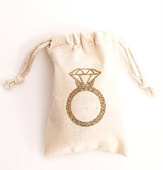 bachelorette ring favor bags by gracefulgreetingco | via 21 Totally Fun Ring Themed Bridal Shower Ideas → https://emmalinebride.com/planning/ring-themed-bridal-shower/