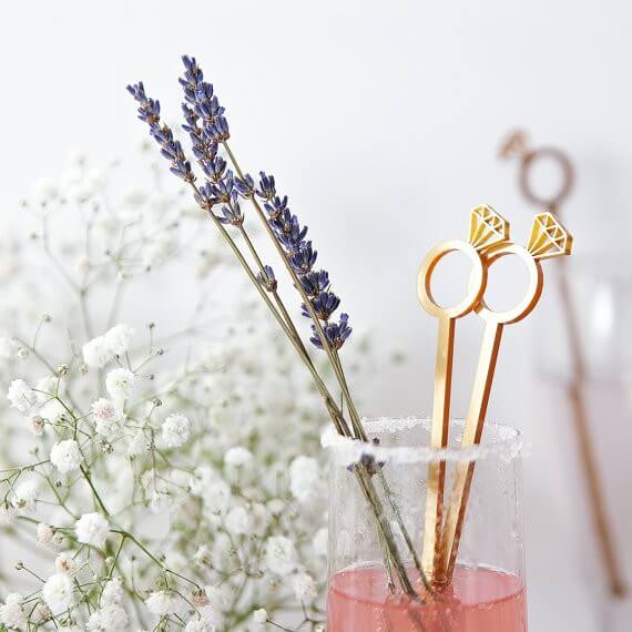 cocktail stirrers by CloudsandCurrents | via 21 Totally Fun Ring Themed Bridal Shower Ideas → https://emmalinebride.com/planning/ring-themed-bridal-shower/
