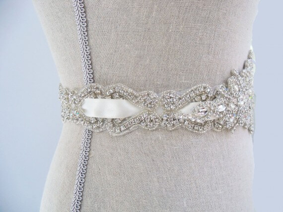 Should I Wear a Sash? - Emmaline Bride | photo via SparkleSM Bridal | https://emmalinebride.com/bride/should-i-wear-a-sash/