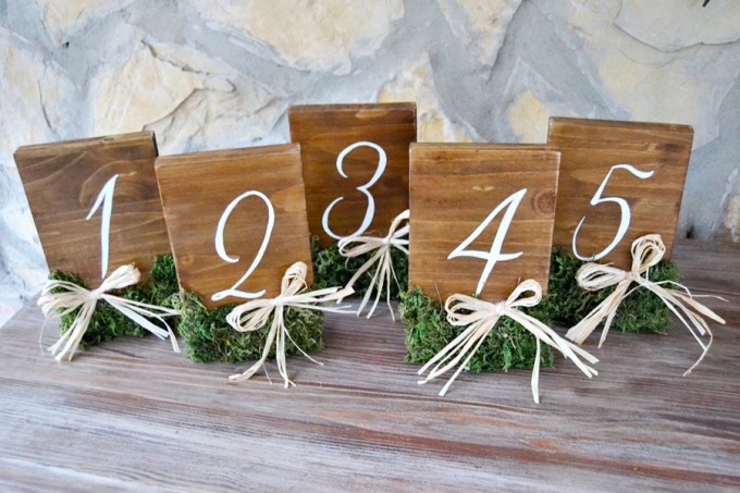 rustic table numbers with moss