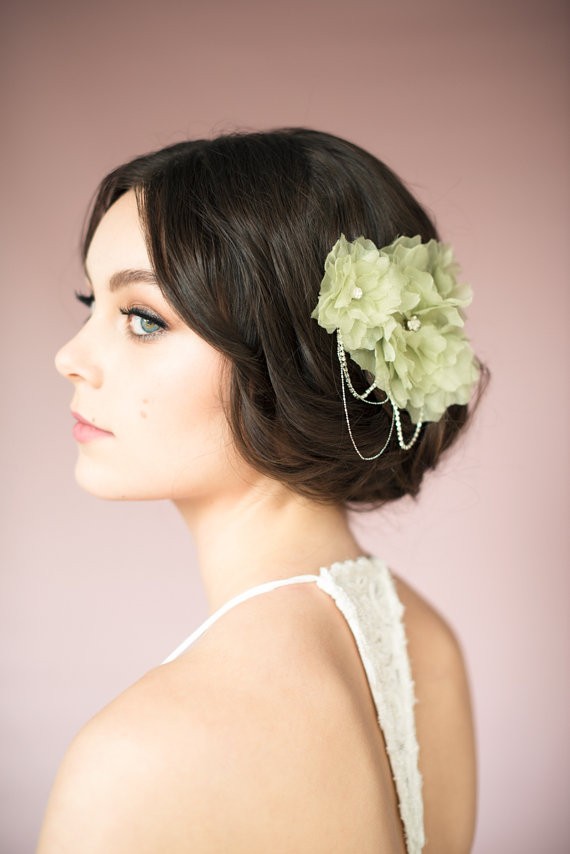 sage green bridal hair accessory | via Sage Wedding Ideas from https://emmalinebride.com/color/sage-green-wedding-ideas/