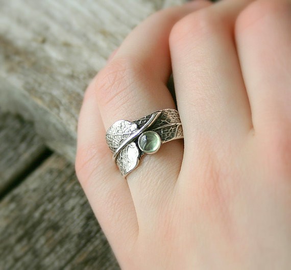 sage green ring by joannerowan | via Sage Wedding Ideas from https://emmalinebride.com/color/sage-green-wedding-ideas/