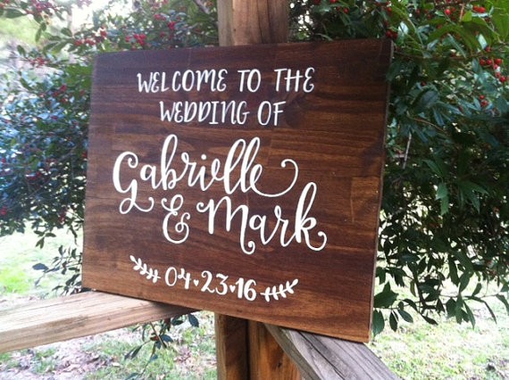 welcome to the wedding of sign by ArtAndSoulShoppe via 26 Things Guests Love at Weddings from A to Z | https://emmalinebride.com/planning/things-guests-love-at-weddings/