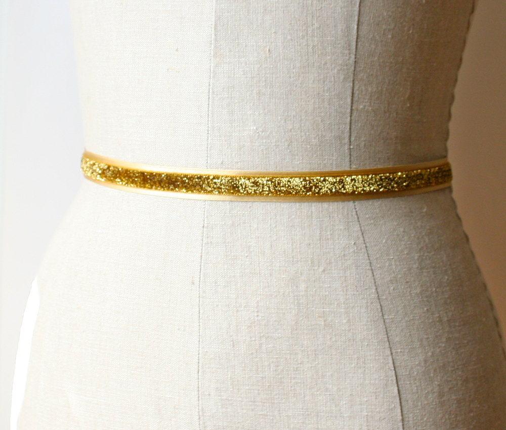 glittery gold sash | elegant bridal sashes by laura stark | https://emmalinebride.com/bride/elegant-bridal-sashes/