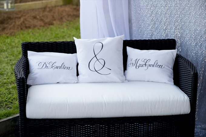 wedding pillows in this Crystal Coast Wedding | North Carolina wedding photographed by Ellen LeRoy Photography - https://emmalinebride.com/real-weddings/breathtaking-crystal-coast-wedding-mara-will-married/