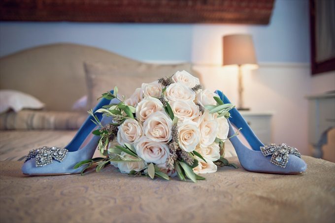 bride's blue wedding heels in destination wedding by Venice, Italy Wedding Planner - Venice Events| An Intimate + Beautiful Venice Wedding at Palazzo Cavalli - https://emmalinebride.com/real-weddings/beautiful-venice-wedding-at-palazzo-cavalli/