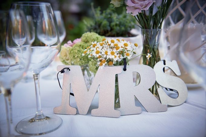 mrs. letter sign decoration in this destination wedding by Venice, Italy Wedding Planner - Venice Events| An Intimate + Beautiful Venice Wedding at Palazzo Cavalli - https://emmalinebride.com/real-weddings/beautiful-venice-wedding-at-palazzo-cavalli/