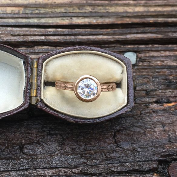 rose gold moissanite engagement ring