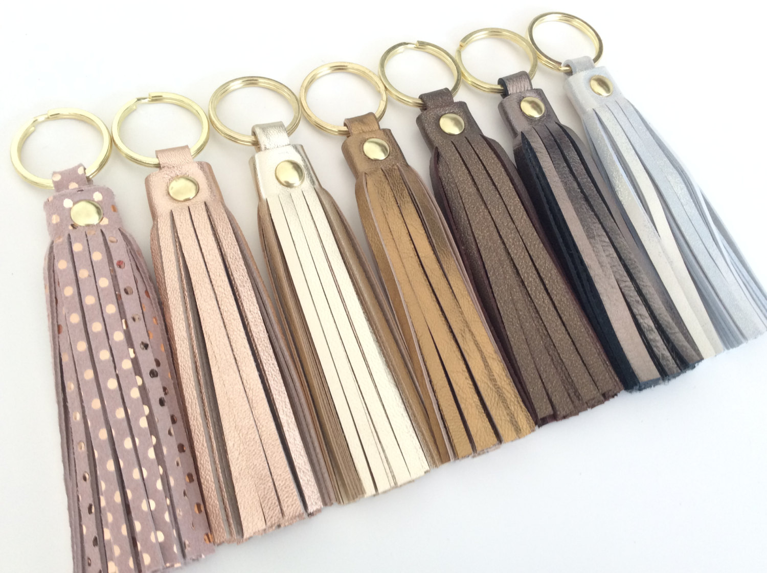leather tassel keychains via http://etsy.me/2mRQX6m