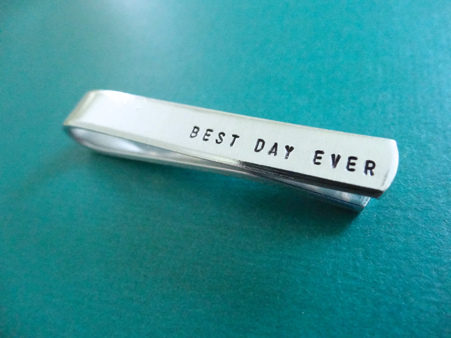 How to Wear a Tie Clip Like a Pro (+ Engraved Tie Clip Gifts for Weddings)