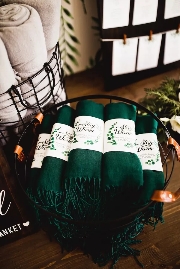 wedding blankets rolled with ribbons and personalized tags