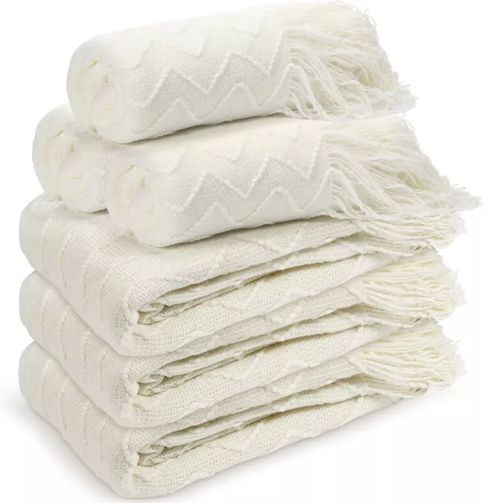 neutral tassel end woven knit blankets for guest favors