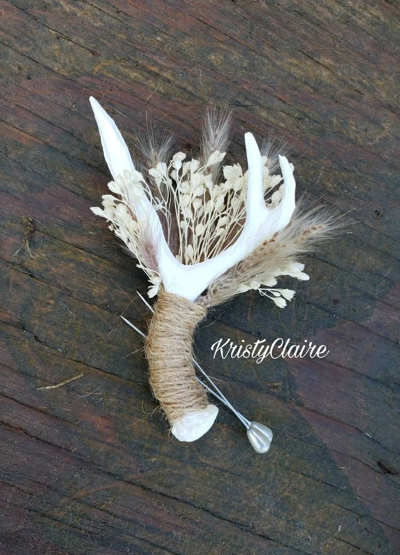 Antler boutonniere for the groom