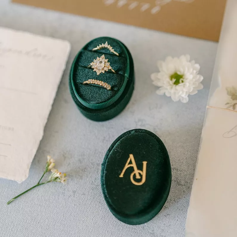 Personalize your wedding with a custom velvet ring box with initials on top