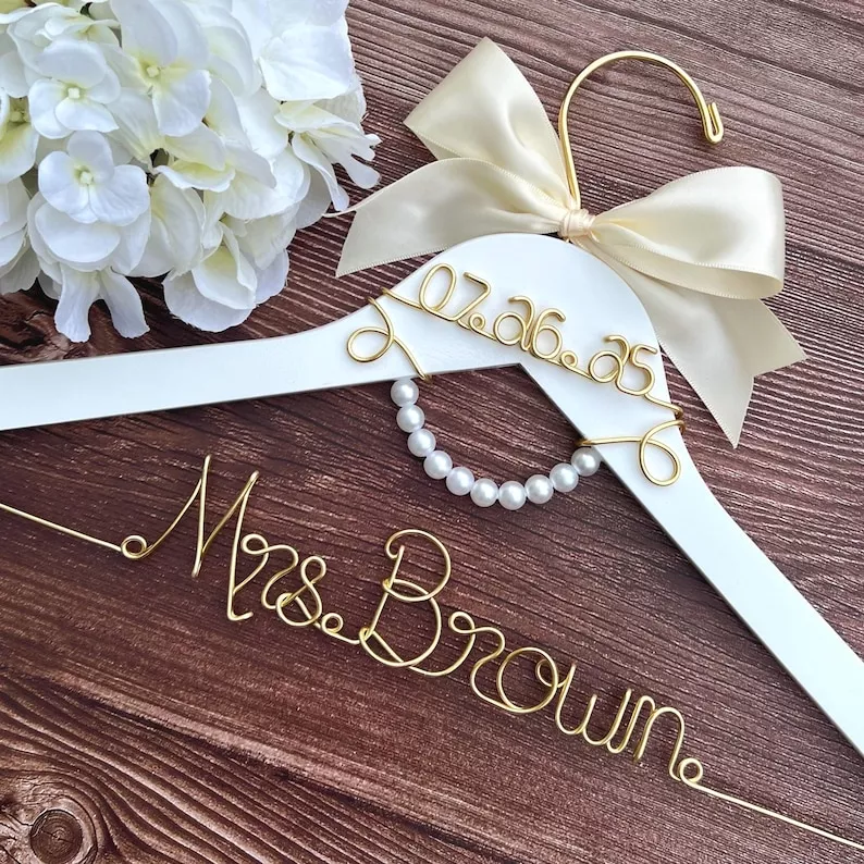 Custom pearls and wire wedding dress hanger you can personalize for wedding day photos