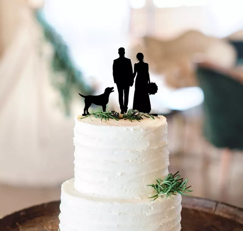 Couple with dog cake topper for wedding