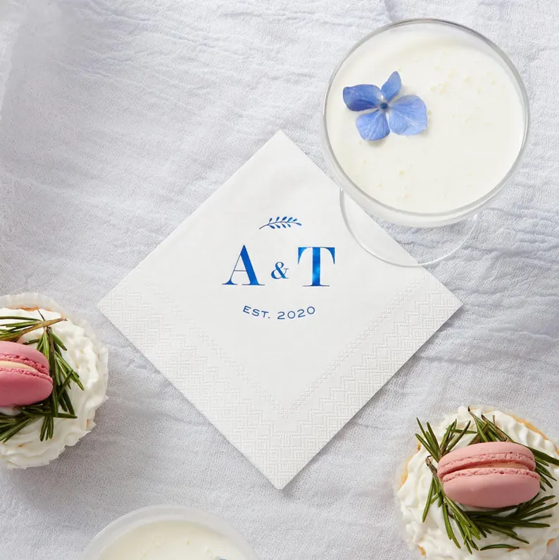 cocktail napkins on a wedding dessert table