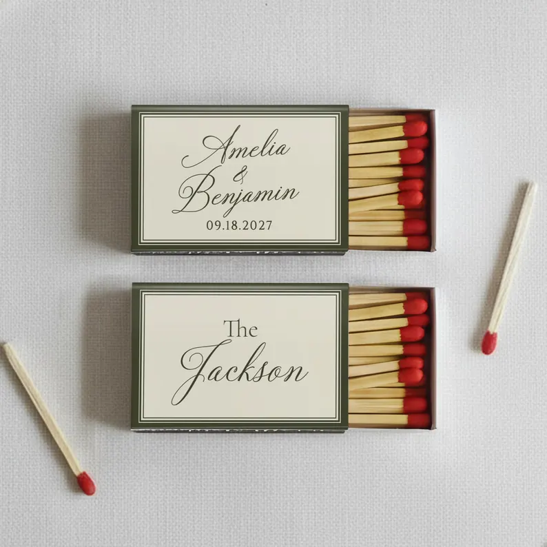 custom cocktail matchbooks displayed near a wedding bar